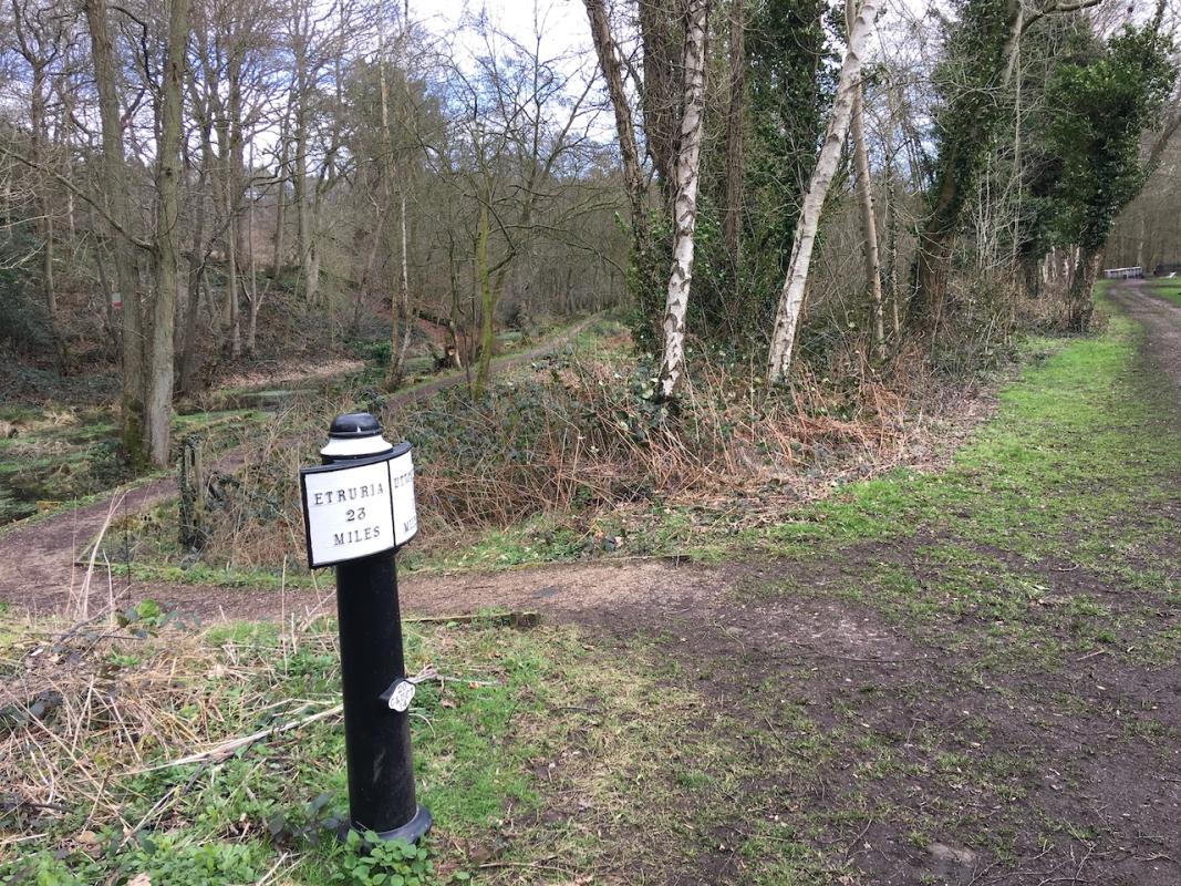 Milepost with improved towpath towards Bridge 70 in the background, March 2019