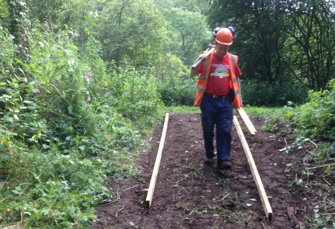 WRG camp at Br70, July 2014 - Pete lays out the first section of path
