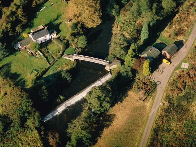 Arial view of Crumpwood Weir and cottage, possibly 1980s