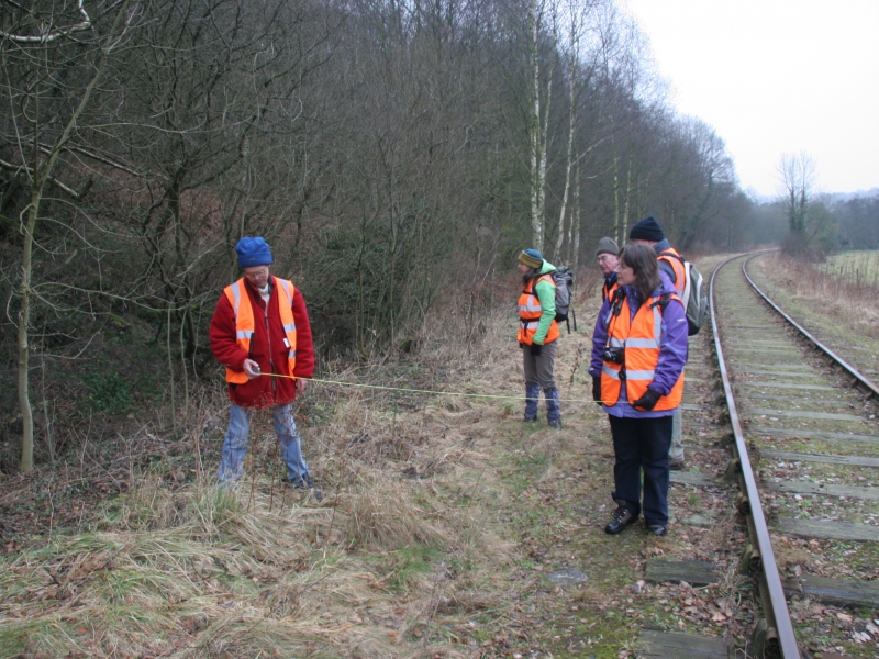 Surveying the line of the Uttoxeter Canal next to the railway, January 2011